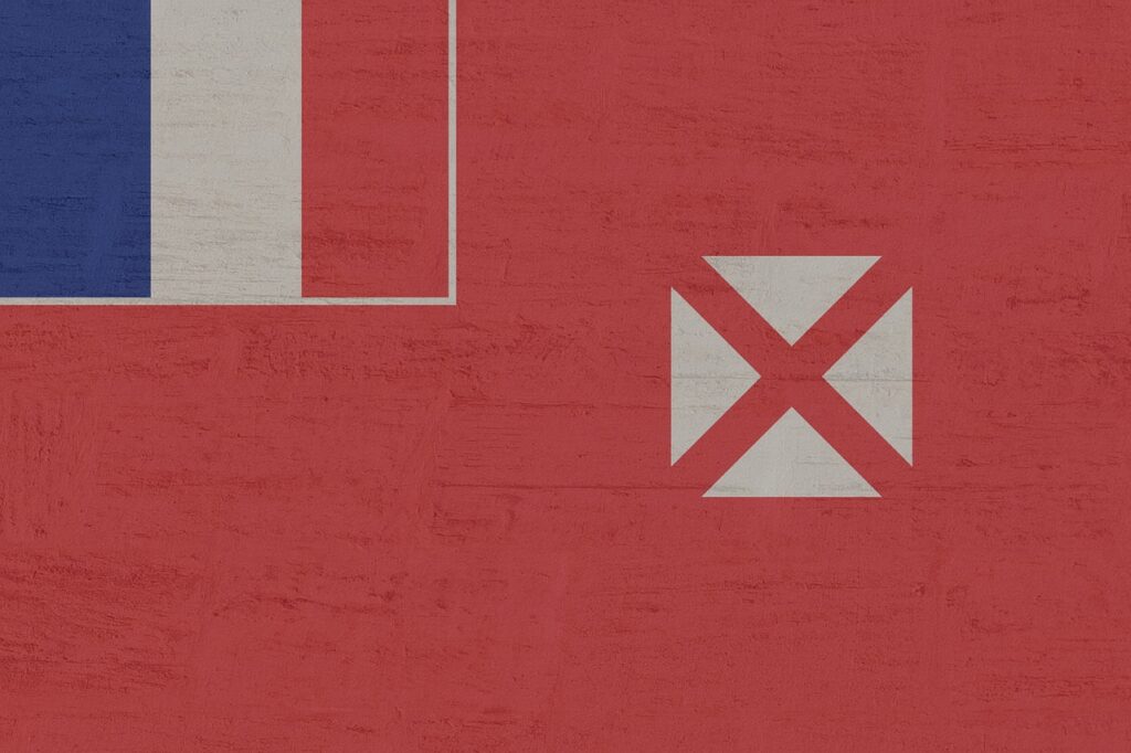 Moderná vlajka Wallisu a Futuny s červeným poľom a bielym symbolom